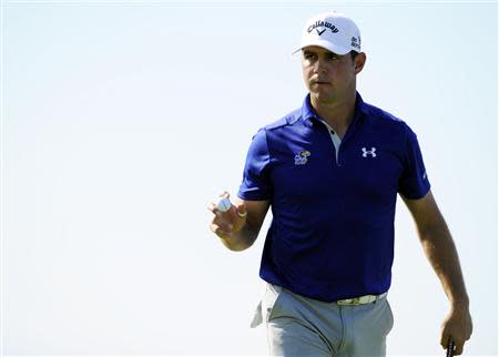 Jan 25, 2014; La Jolla, CA, USA; Gary Woodland after making his putt on the fourteenth hole during the third round of the Farmers Insurance Open golf tournament at Torrey Pines Municipal Golf Course - South Co. Mandatory Credit: Christopher Hanewinckel-USA TODAY Sports