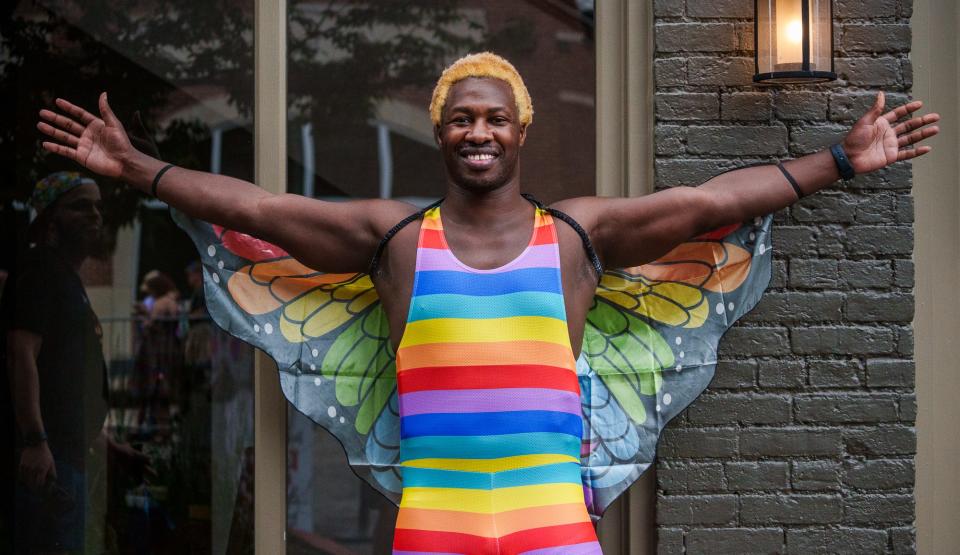 Micheal Johnson poses during the Indy Pride Parade on Saturday, June 11, 2022, along Mass Ave in Indianapolis. "I wanted the bodysuit but I wanted to go for a butterfly look," Johnson said. "I just wanted to come out and have a blast. This is the best day ever. You can't have more fun than this."