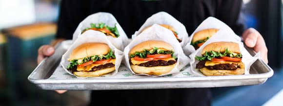 A tray of Shake Shack burgers