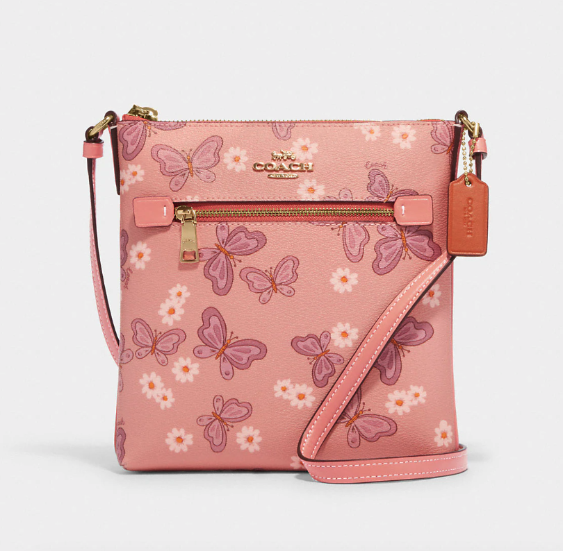 Mini Rowan File Bag With Lovely Butterfly Print. Image via Coach Outlet.