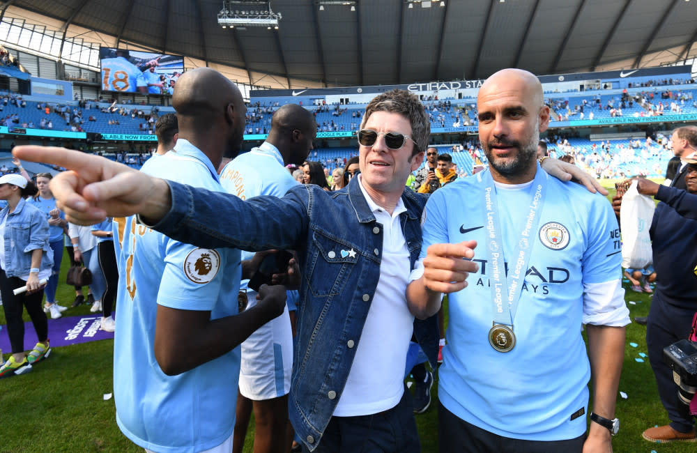 Noel Gallagher and Pep Guardiola - MAY 2018 - Manchester City title win at Etihad Stadium