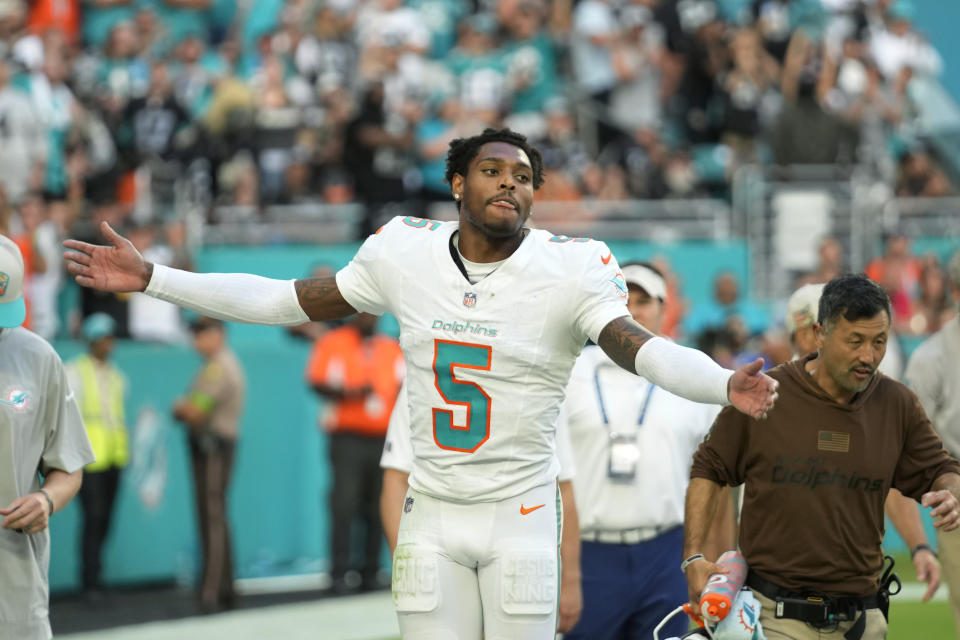 Miami Dolphins cornerback Jalen Ramsey (5) celebrates after intercepting a pass in the end zone during the second half of an NFL football game against the Las Vegas Raiders, Sunday, Nov. 19, 2023, in Miami Gardens, Fla. The Dolphins defeated the Raiders 20-13. (AP Photo/Rebecca Blackwell)