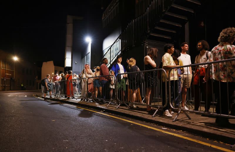 People arrive for the "00:01" event organised by Egyptian Elbows at Oval Space nightclub, as England lifted most coronavirus disease (COVID-19) restrictions at midnight, in London