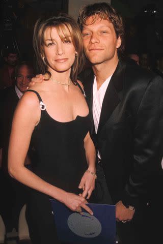 <p>Dave Benett/Getty</p> Jon Bon Jovi and wife Dorothea in 1996