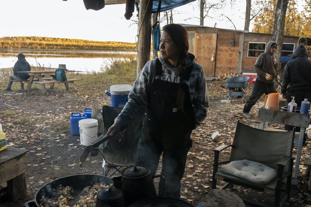 Giovanna Stevens grew up harvesting salmon at her family’s fish camp on Alaska's Yukon River. Climate change is interrupting hunting and fishing traditions in many areas. <a href="https://newsroom.ap.org/detail/aYukonRiverDisappearingSalmon/fa2665d81c31479a916a237985eec432/photo" rel="nofollow noopener" target="_blank" data-ylk="slk:AP Photo/Nathan Howard;elm:context_link;itc:0;sec:content-canvas" class="link ">AP Photo/Nathan Howard</a>