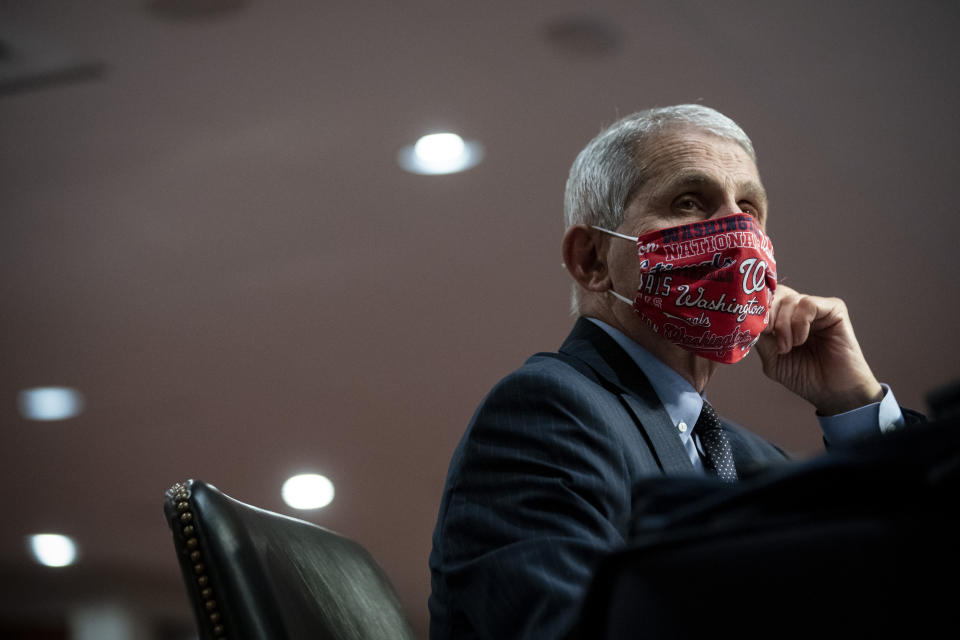 Director of the National Institute of Allergy and Infectious Diseases Dr. Anthony Fauci wears a face covering as he listens during a Senate Health, Education, Labor and Pensions Committee hearing on Capitol Hill in Washington, Tuesday, June 30, 2020. (Al Drago/Pool via AP)