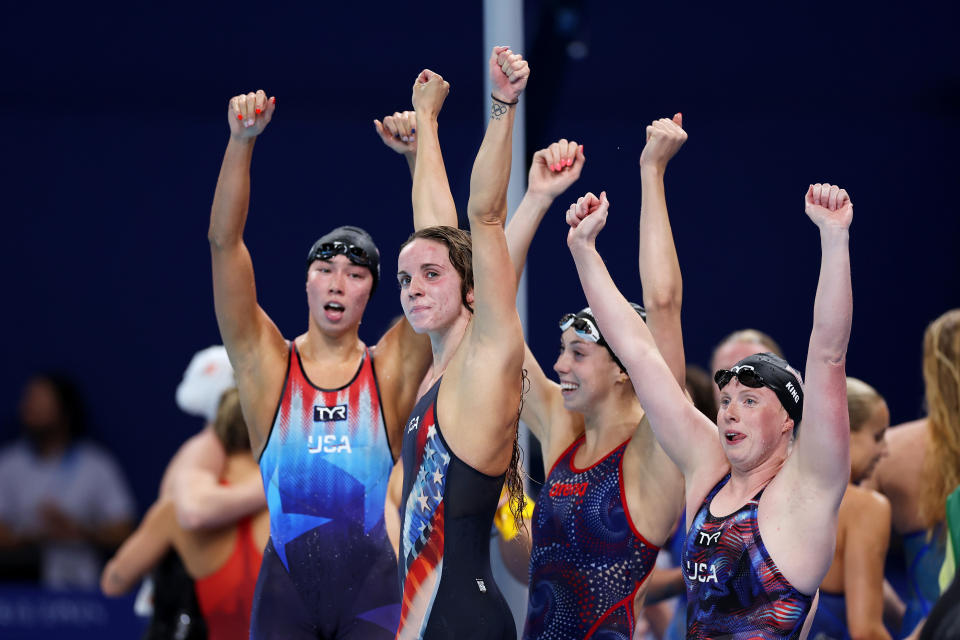 NANTERRE, FRANCE - AUGUST 04: Regan Smith, Lilly King, Gretchen Walsh and Torri Huske of Team United States celebrate after winning gold in a world record time in the Women's 4x100m Medley Relay Final on day nine of the Olympic Games Paris 2024 at Paris La Defense Arena on August 04, 2024 in Nanterre, France. (Photo by Quinn Rooney/Getty Images)