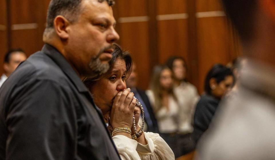 Alexander Camps and Maria Lacayo-Camps, whose 18-year-old daughter was killed during a botched robbery over three pair of sneakers, react as Miami-Dade Circuit Court Judge Miguel M. de la O reads the guilty verdict. George Walton, 23, was convicted Wednesday, Feb. 21, 2024, of first-degree murder and sentenced to life in prison.