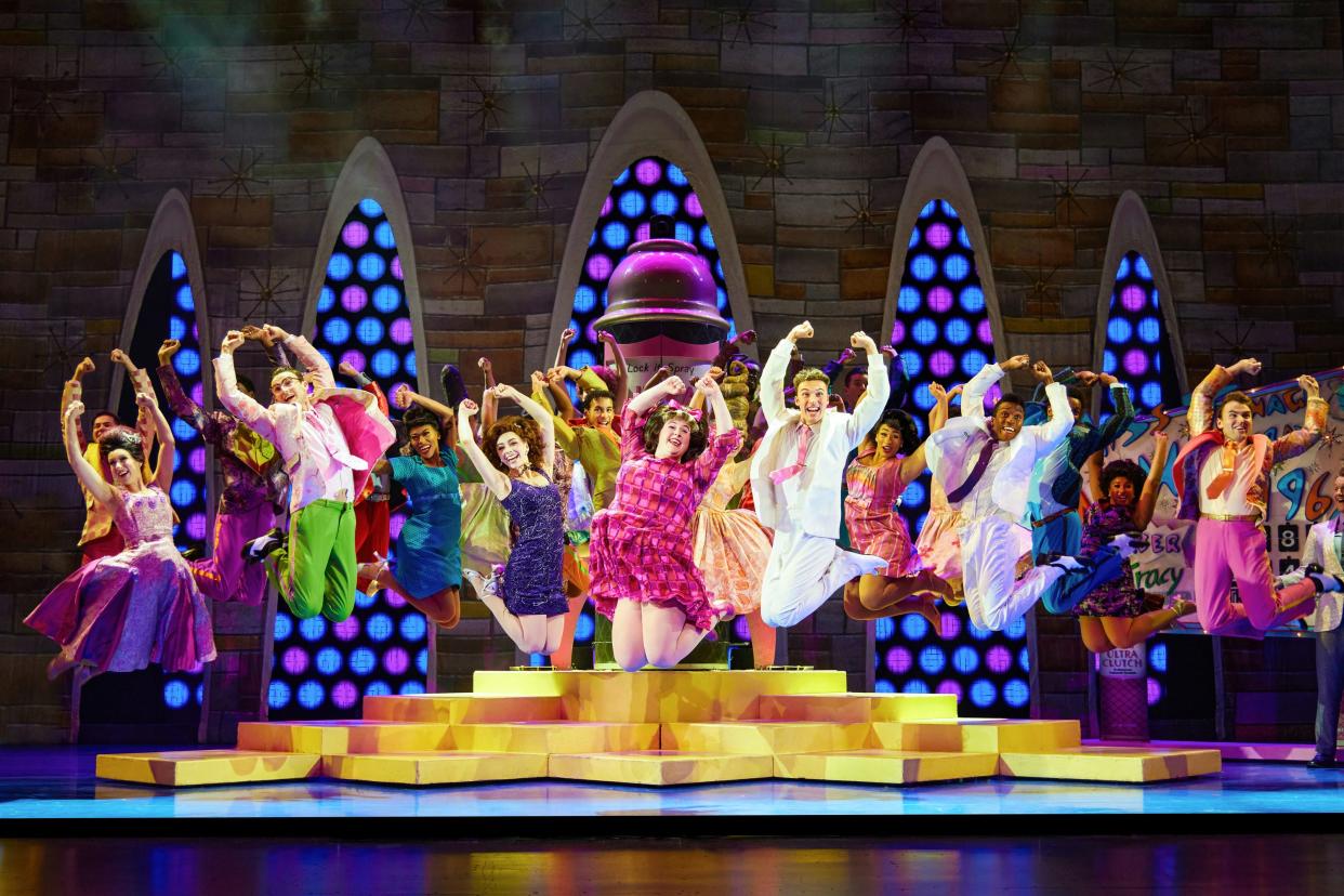 Caroline Eiseman, center, as “Tracy Turnblad” and Company perform "You Can't Stop the Beat" in Hairspray.