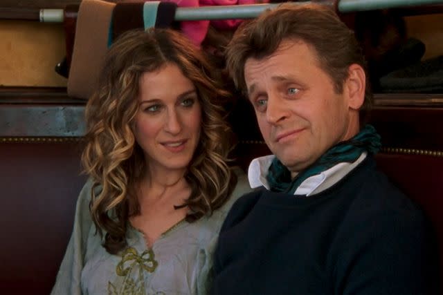 <p>HBO</p> Sarah Jessica Parker as Carrie Bradshaw and Mikhail Baryshnikov as Alexandr Petrovsky in 'Sex and the City'.