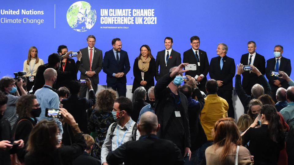 Ministers and representatives of the Beyond Oil and Gas Alliance on stage at the U.N. Climate Change Conference.