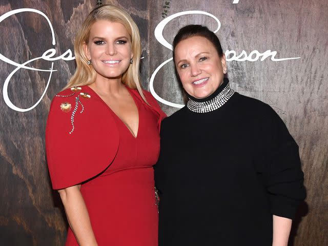 <p>Kevin Mazur/Getty</p> Jessica Simpson and Tina Simpson celebrate "Open Book" on February 05, 2020 in New York City.