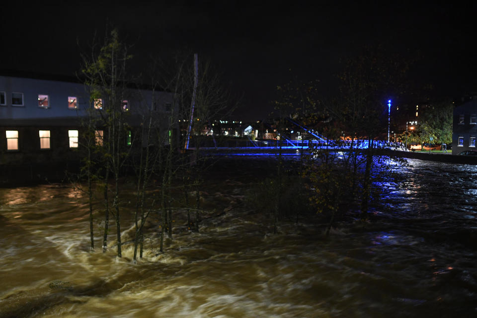 HAWICK, SCOTLAND - OCTOBER 28: Trees are seen submerged in the River Teviot on October 28, 2021 in Hawick, Scotland. A major incident was declared earlier after sustained heavy rain caused the River Teviot to swell and threaten to flood. Around 500 homes are thought to be affected if the town floods and residents have been evacuated. (Photo by Peter Summers/Getty Images)
