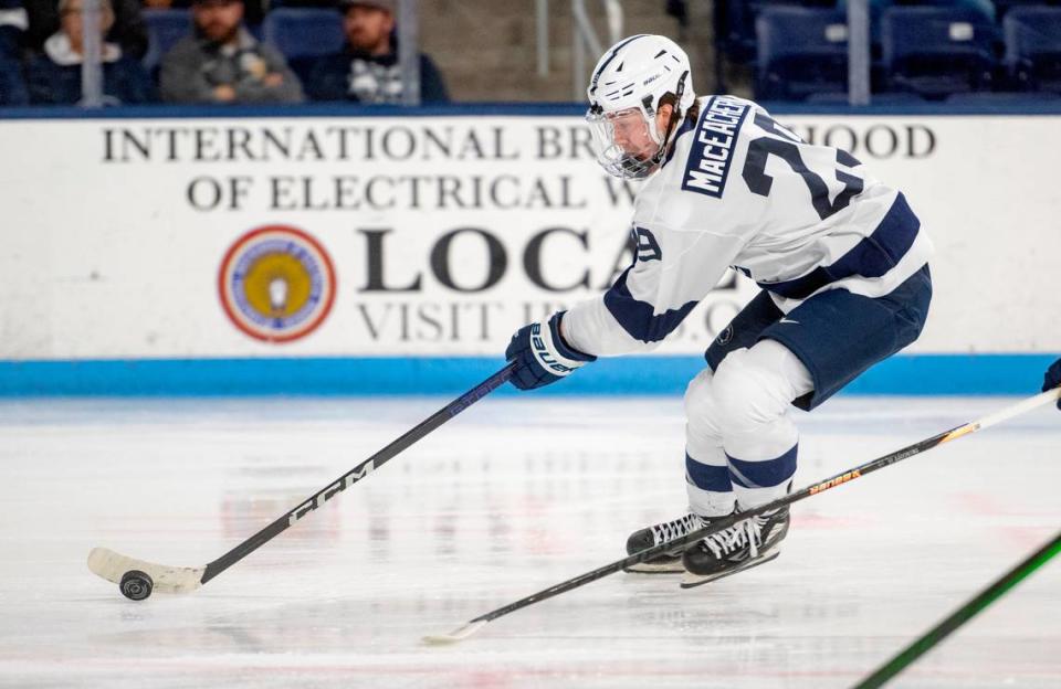 Penn State’s Connor MacEachern skates down the ice with the puck during the game against Michigan on Friday, Nov. 4, 2022 at Pegula Ice Arena.