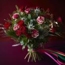 <p>'With the hope that we’ll be able to host loved ones this Christmas, many of us will be looking to dress our homes even more beautifully over the festive season,' says Chris Wood, Partner & Flower Product Developer. 'Flowers are the perfect way to add vibrancy. Our Red Christmas bouquet is a classic, with red roses and luscious textural foliage – it also includes these stunning roses with unique red and cream stripes. It would make a wonderful addition to your Christmas decor.'</p>