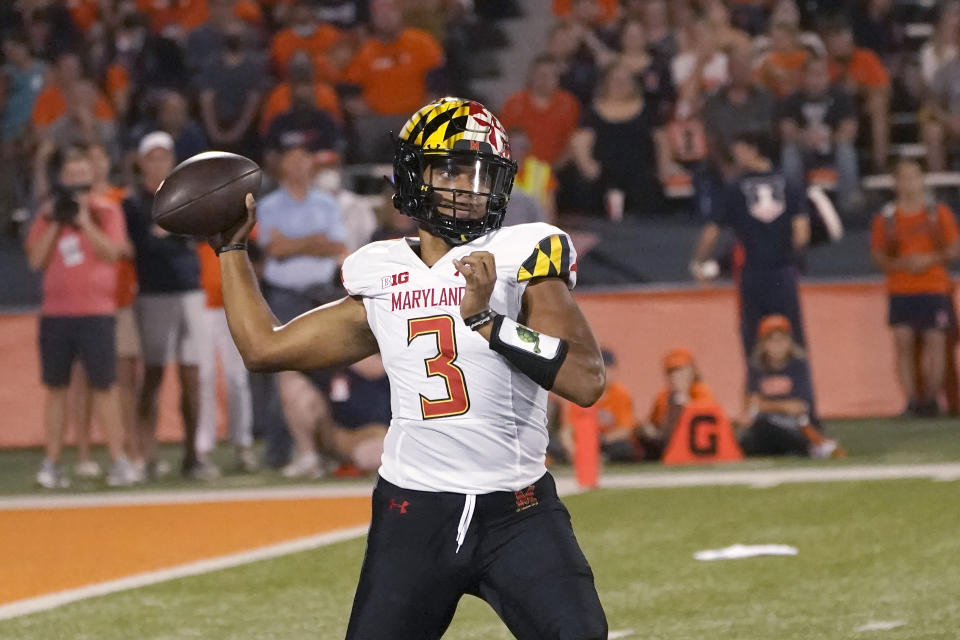 Maryland quarterback Taulia Tagovailoa throws a pass during the first half of the team's NCAA college football game against Illinois on Friday, Sept. 17, 2021, in Champaign, Ill. (AP Photo/Charles Rex Arbogast)