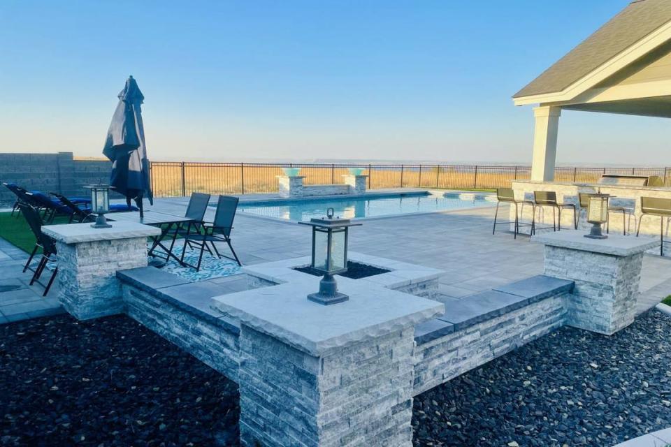 This Westcliffe Heights pool in Richland’s Badger Mountain neighborhood welcomes up to 15 guests and features a large shallow area, tanning edge, waterfall, fire pit, outdoor bar and views of the Columbia River.