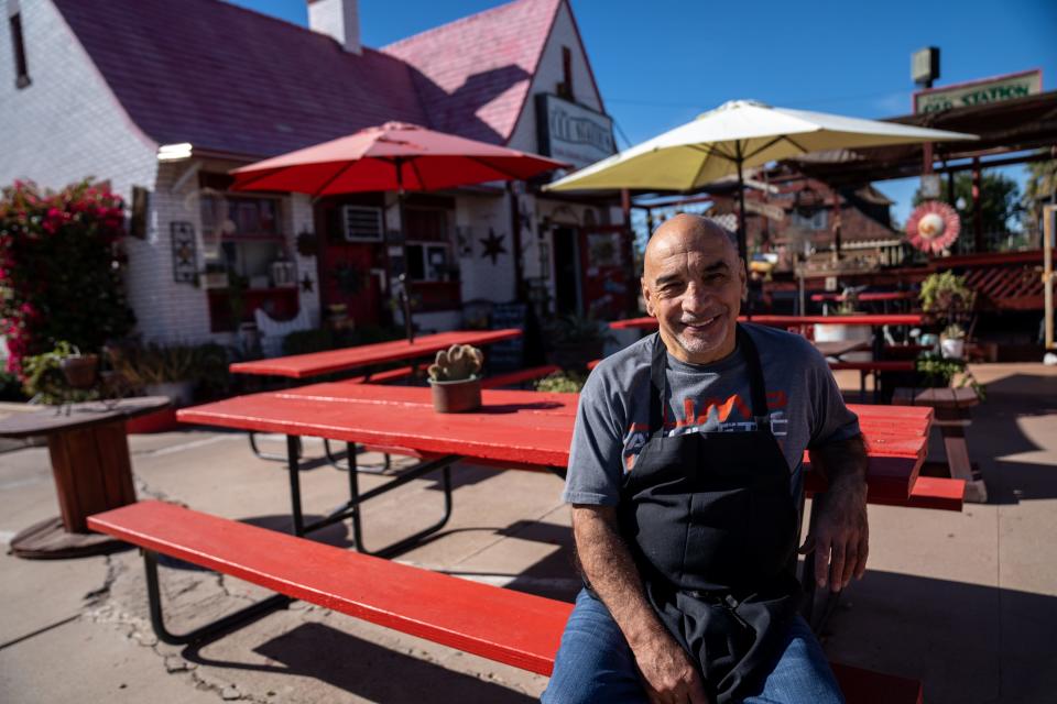 Joe Faillace, owner of The Old Station, poses for a portrait outside his sandwich shop located near "The Zone" in Phoenix on Nov. 22, 2023.