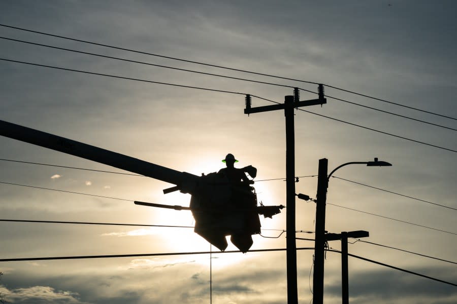 A lineman works to restore service after Hurricane Idalia crossed the state on August 30, 2023 in Perry, Florida. The storm made landfall at Keaton Beach, Florida as a category 3 hurricane. (Photo by Sean Rayford/Getty Images)