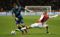 Football - AS Monaco v Arsenal - UEFA Champions League Second Round Second Leg - Stade Louis II, Monaco - 17/3/15 Arsenal's Mesut Ozil in action with Monaco's Aymen Abdennour Action Images via Reuters / John Sibley Livepic EDITORIAL USE ONLY.