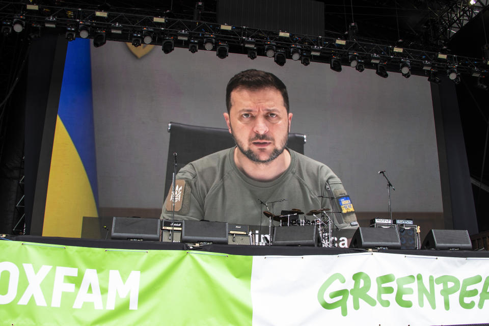 Ukrainian President Volodymyr Zelenskyy speaks via video at the Glastonbury Festival in Worthy Farm, Somerset, England, Friday, June 24, 2022. (Photo by Joel C Ryan/Invision/AP)