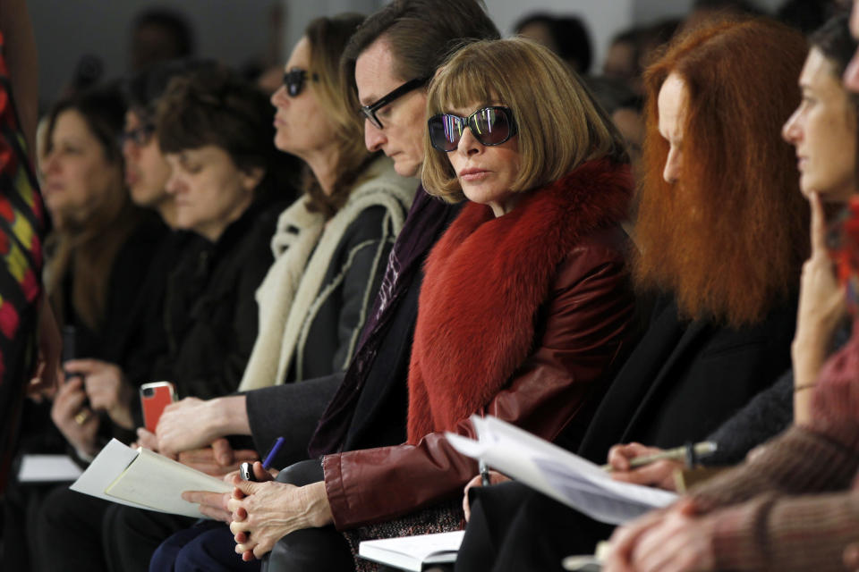 Vogue editor Anna Wintour watches a presentation of the Rodarte Autumn/Winter 2013 collection during New York Fashion Week