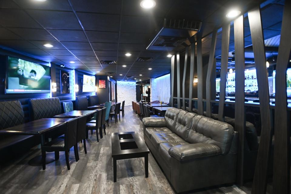 A peek inside the Comfort Zone Cigar Lounge & Bistro in Lansing, pictured Wednesday, Nov. 29, 2023.