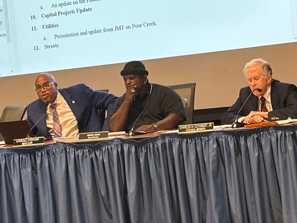 With Ward 1 Councilor Marlow Jones in the middle, Mayor Sam Parham, left, unleashes a tirade of criticism toward Ward 4 Councilor Charlie Cuthbert Wednesday, July 5, 2023 after the latter voted against resolutions to adopt citywide financial policies and to issue bonds for the construction of a new courts complex downtown. Parham accused Cuthbert of having 'amnesia' about previous discussions on the new courthouse and of 'making a mockery' of anything the city does toward progress. Parham then called for a special closed session and could be heard yelling at Cuthbert through the door of the meeting room.