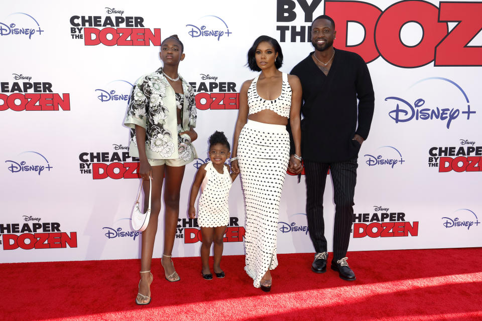 LOS ANGELES, CALIFORNIA - MARCH 16: (L-R) Zaya Wade, Kaavia James Union Wade, Gabrielle Union, and Dwyane Wade attend the premiere of Disney's "Cheaper By The Dozen" on March 16, 2022 in Los Angeles, California. (Photo by Frazer Harrison/WireImage)