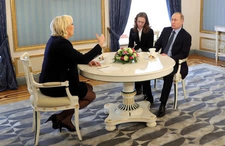 Russian President Vladimir Putin meets with Marine Le Pen, French National Front (FN) political party leader and candidate for the French 2017 presidential election, in Moscow, Russia March 24, 2017. Sputnik/Mikhail Klimentyev/Kremlin via REUTERS