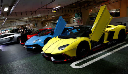 Lamborghini supercars are seen during a meeting of supercar fans at the Umihotaru parking area in Kisarazu, Japan October 21, 2017. Picture taken October 21, 2017. REUTERS/Toru Hanai