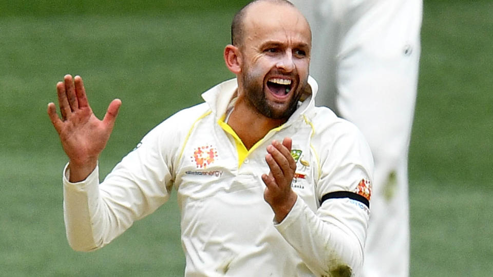 Nathan Lyon celebrates after dismissing Rohit Sharma. (Photo by Daniel Kalisz – CA/Cricket Australia/Getty Images)