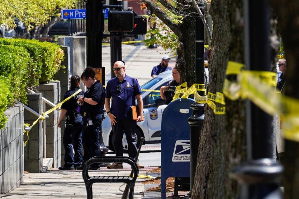 Police deploy at the scene of the mass shooting in downtown Louisville (REUTERS)