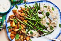 Roast jarred marinated artichoke hearts and cubed potatoes until crispy, then toss a thick halibut fillet and a handful of green beans onto the same pan for this simple sheet-pan dinner. <a href="https://www.epicurious.com/recipes/food/views/roasted-nicoise-salad-with-halibut-green-beans-potatoes-artichoke-hearts?mbid=synd_yahoo_rss" rel="nofollow noopener" target="_blank" data-ylk="slk:See recipe." class="link ">See recipe.</a>