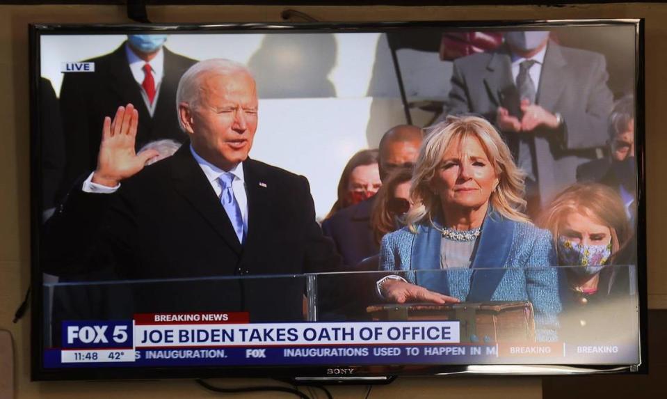 June EverettÕs barber shop displays the Fox 5 broadcast of the swearing in of Joe Biden as President of the United States while standing next to his wife Jill Biden as she, her staff, and customers watched this historic Inauguration. On Wednesday, January 20, 2021 Barbados-born barber shop owner June Everett watches along with customers and employees the Inauguration of President-elect Joe Biden and Vice President-elect Kamala Harris as the nationÕs first Hispanic Supreme Court justice, Sonia Sotomayor swears in the first African-American woman of Caribbean and East Asian descent as vice president of the United States. Everett barber shop is in the heart of the U street just few block alway from HBCU, Howard University, where Vice-President Kamala Harris went to college.