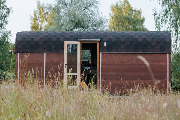 Vagabond Haven's most economical option, the Nature Pod sits on a glulam-beam platform and is framed with Thermowood: pine timber treated with heat to improve its longevity. Asphalt-coated fiberglass shingles are used to line the roof.