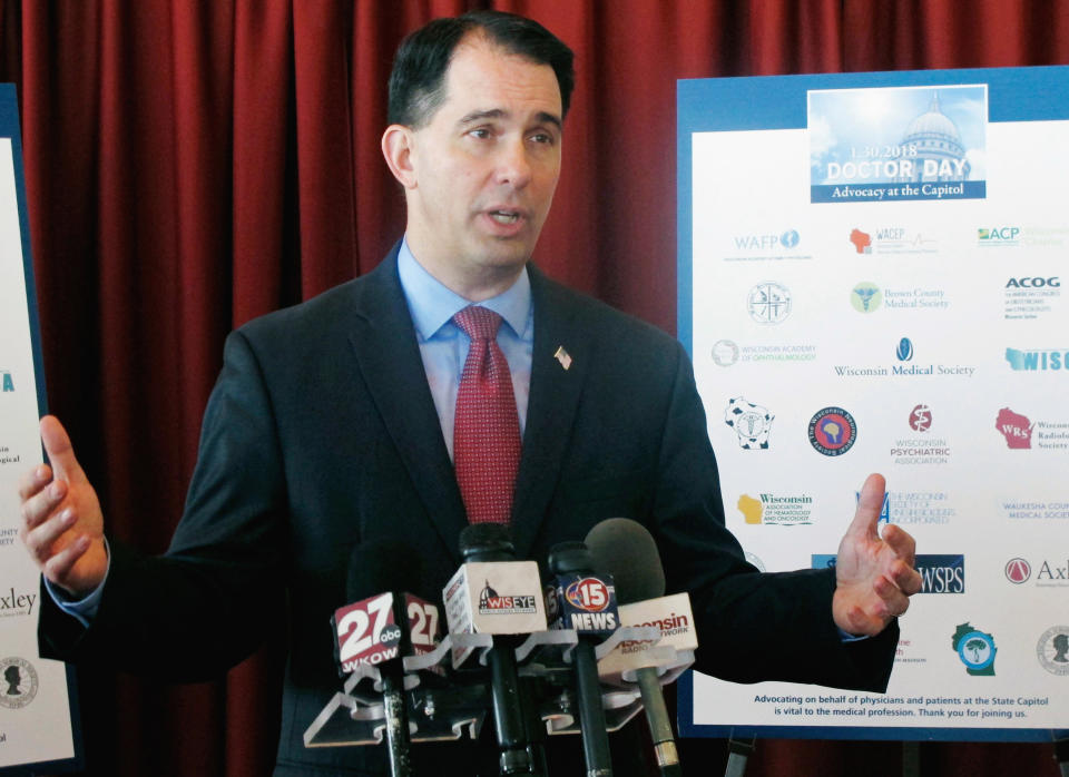 FILE - In this Jan. 30, 2018, file photo, Wisconsin Gov. Scott Walker speaks at a news conference in Madison, Wis. Eight Democrats are taking on Walker in the Tuesday, Aug. 14, 2018, as he seeks a third term, a sign of just how badly the party wants to dethrone one of the GOP's most recognizable governors. (AP Photo/Scott Bauer, File)