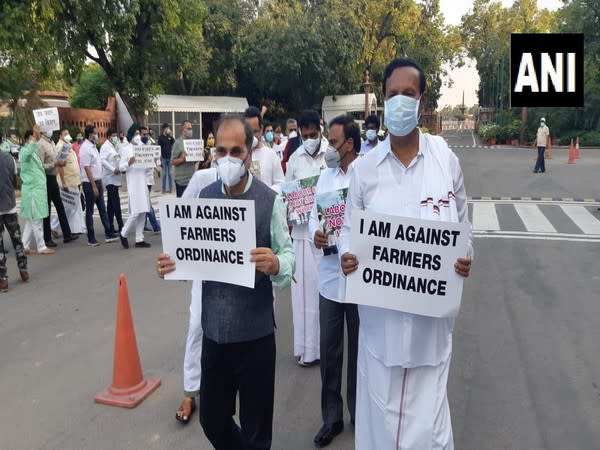 Opposition, boycotting House, staged protest in Parliament at Gandhi and Ambedkar statue on Wednesday. Photo/ANI