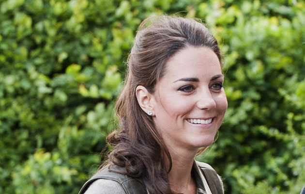 Catherine, Duchess of Cambridge interacts with schoolchildren at an 'Expanding Horizons' Primary School camp, taking part in various outdoor activities at the Widehorizons Margaret McMillan House in Kent, on June 17, 2012 in Wrotham, England. (Photo by David Parker - WPA Pool / Getty Images)