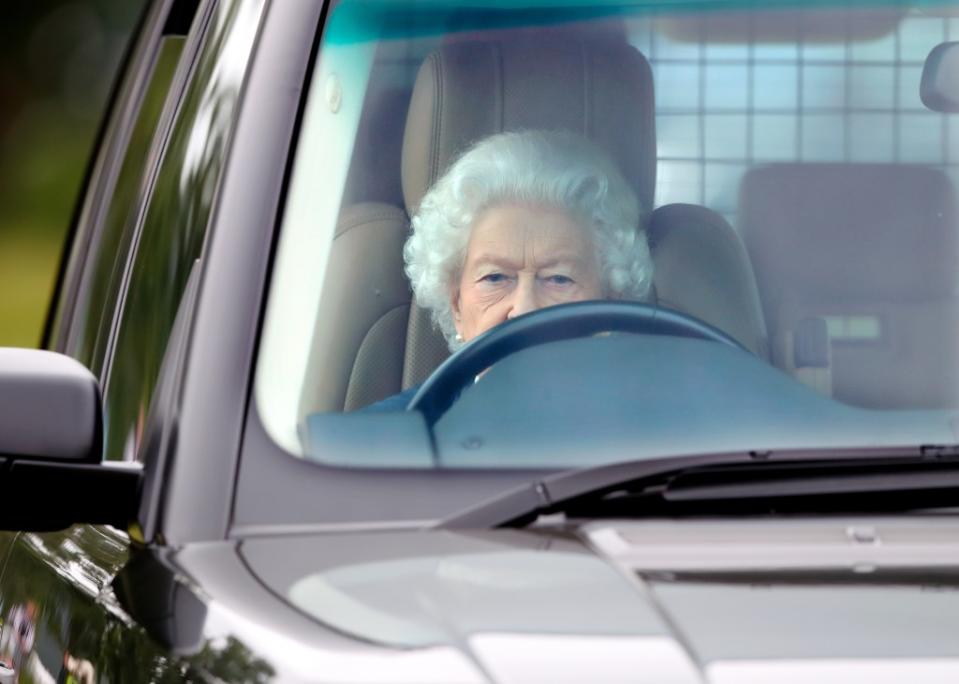 Her Majesty, seen here driving her Range Rover as she attends Day 2 of the Royal Windsor Horse Show in Home Park, Windsor Castle in July 2021 in Windsor, England, loved to get behind the wheel. Getty Images