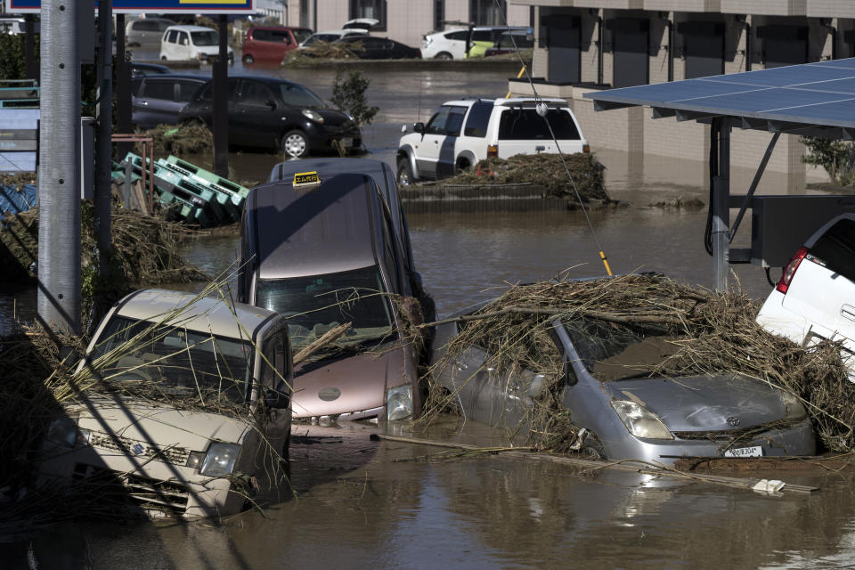 Vehicles sit partially submerged in floodwater following the passage of Typhoon Hagibis on Oct. 13, 2019, in Sano, Tochigi Prefecture, Japan. (Photo: Tomohiro Ohsumi/Getty Images)