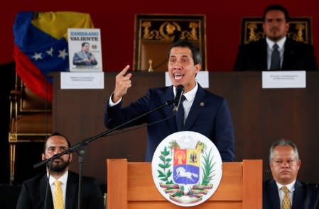 FILE PHOTO: Venezuelan opposition leader Juan Guaido, who many nations have recognised as the country's rightful interim ruler, speaks during a session of Venezuela’s National Assembly in Caracas