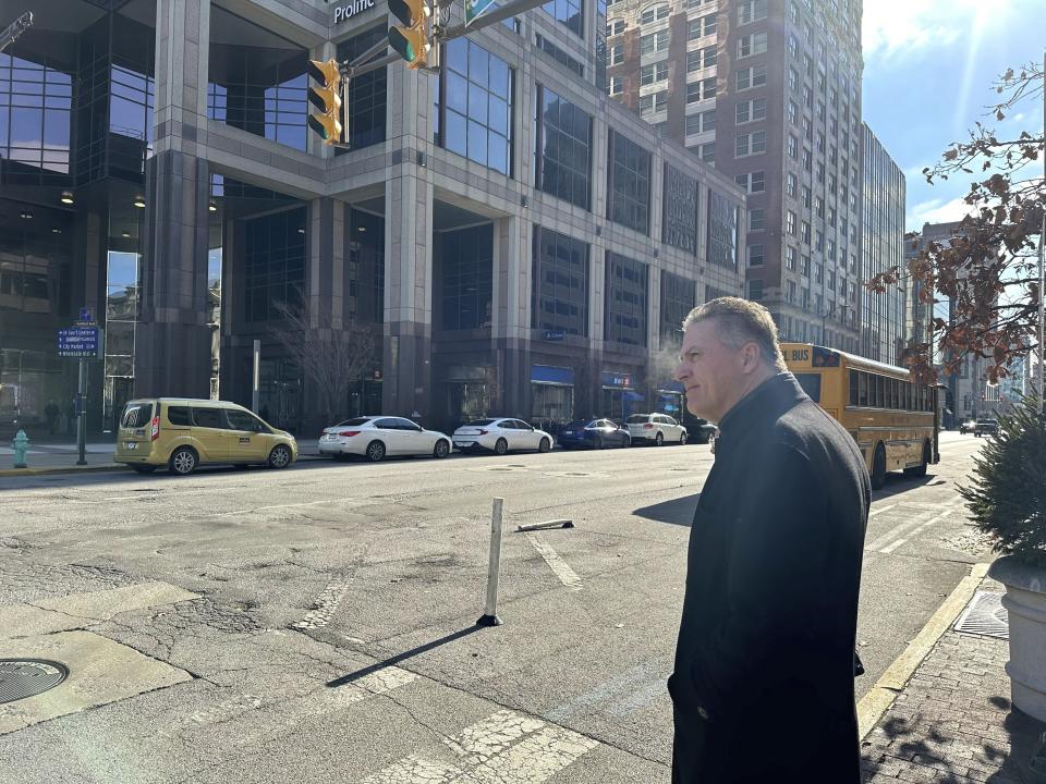 Former Indiana state Rep. Sean Eberhart, 57, leaves a hearing at the Birch Bayh Federal Building U.S. Courthouse, Tuesday, Nov. 28, 2023, in Indianapolis. Eberhart pleaded guilty before a federal judge to a fraud charge. He has been accused of accepting promises of lucrative employment from a casino company in return for favorable action during his time in the General Assembly in 2019. (AP Photo/Isabella Volmert)