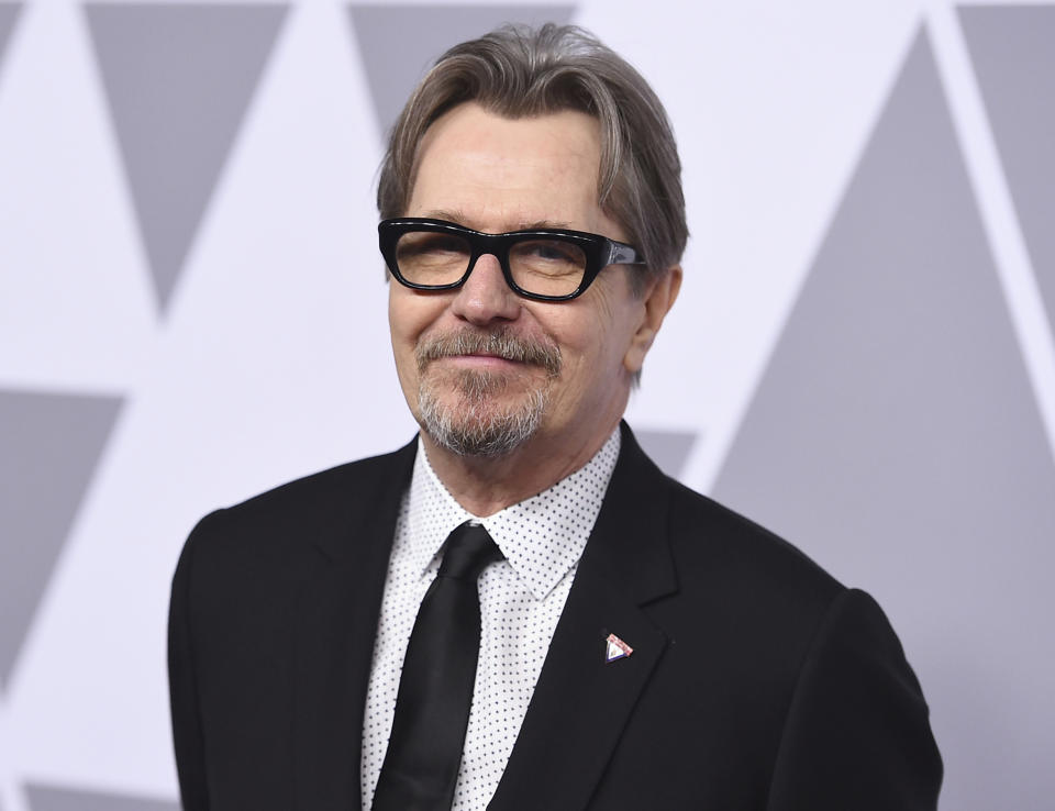 FILE - Gary Oldman arrives at the 90th Academy Awards Nominees Luncheon in Beverly Hills, Calif., on Feb. 5, 2018. Oldman, 62, portrays Herman Mankiewicz, who wrote “Citizen Kane” before drinking himself to death at the age of 55, in the David Fincher film "Mank." (Photo by Jordan Strauss/Invision/AP, File)