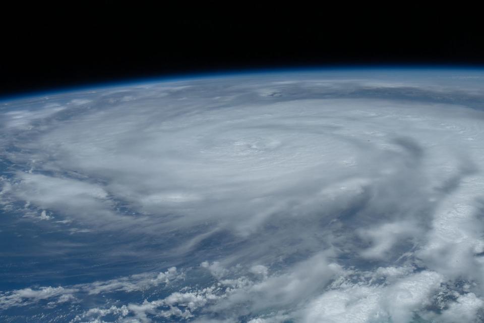 hurricane ida swirling clouds dominate the earth as seen from space