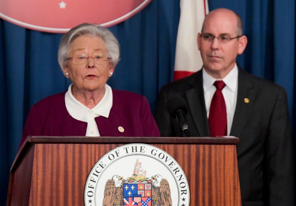 Alabama Governor Kay Ivey discusses Correctional Incentive Time as State Senator Clyde Chambliss, Jr., looks on during a press briefing at the state capitol building in Montgomery, Ala., on Monday January 9, 2023.