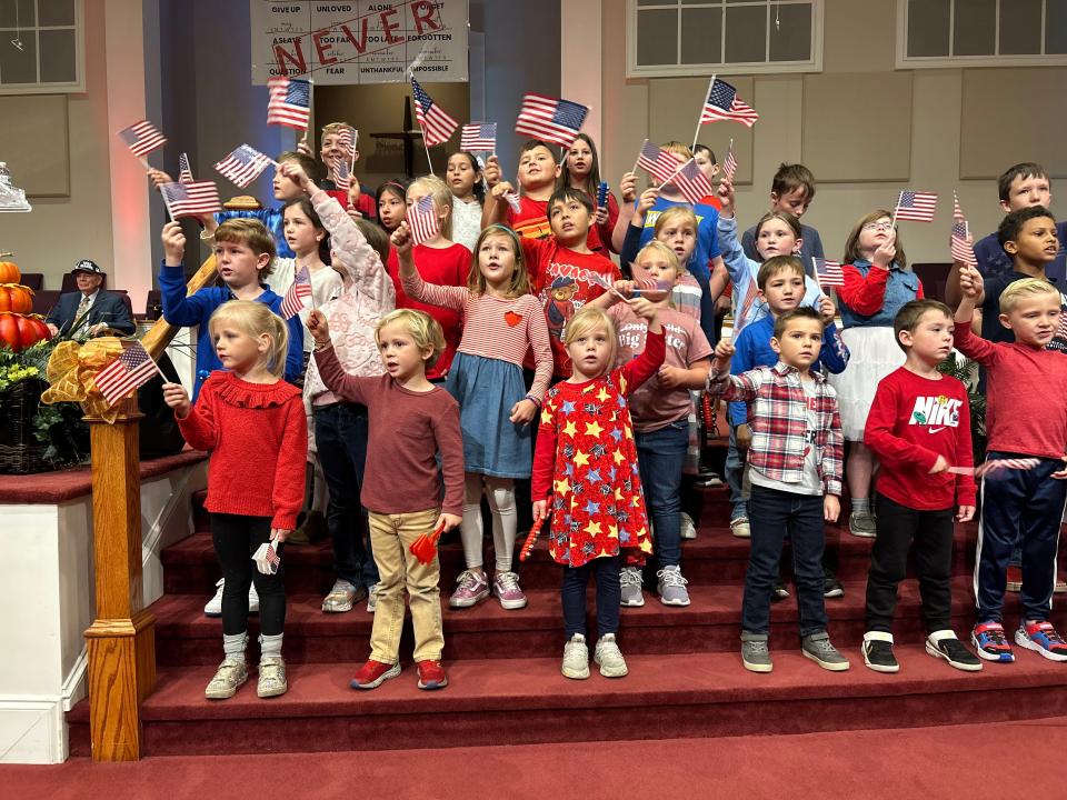 Children from the Christian School performs song for Veterans at Temple Baptist Church Veterans Day Breakfast