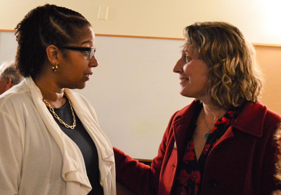 Nicole Bolden, city clerk, talks with Mayor Kerry Thomson on Tuesday, May 2, 2023, at the Democratic watch party.