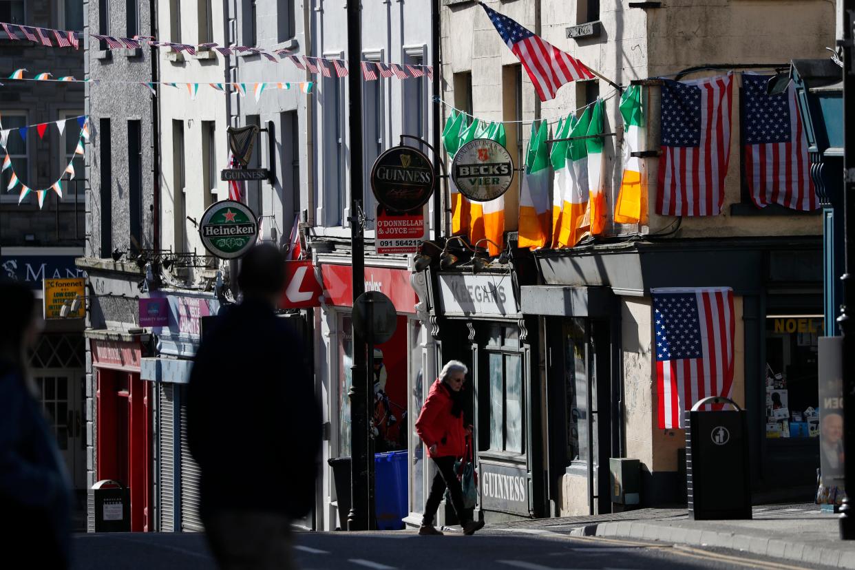 Bunting and US flags have been put up in Ballina (AP Photo/Peter Morrison)