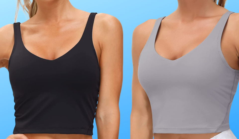 two women wearing tank top-style sports bras in gray and black